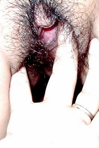 chubby chick sensually posing in lingerie